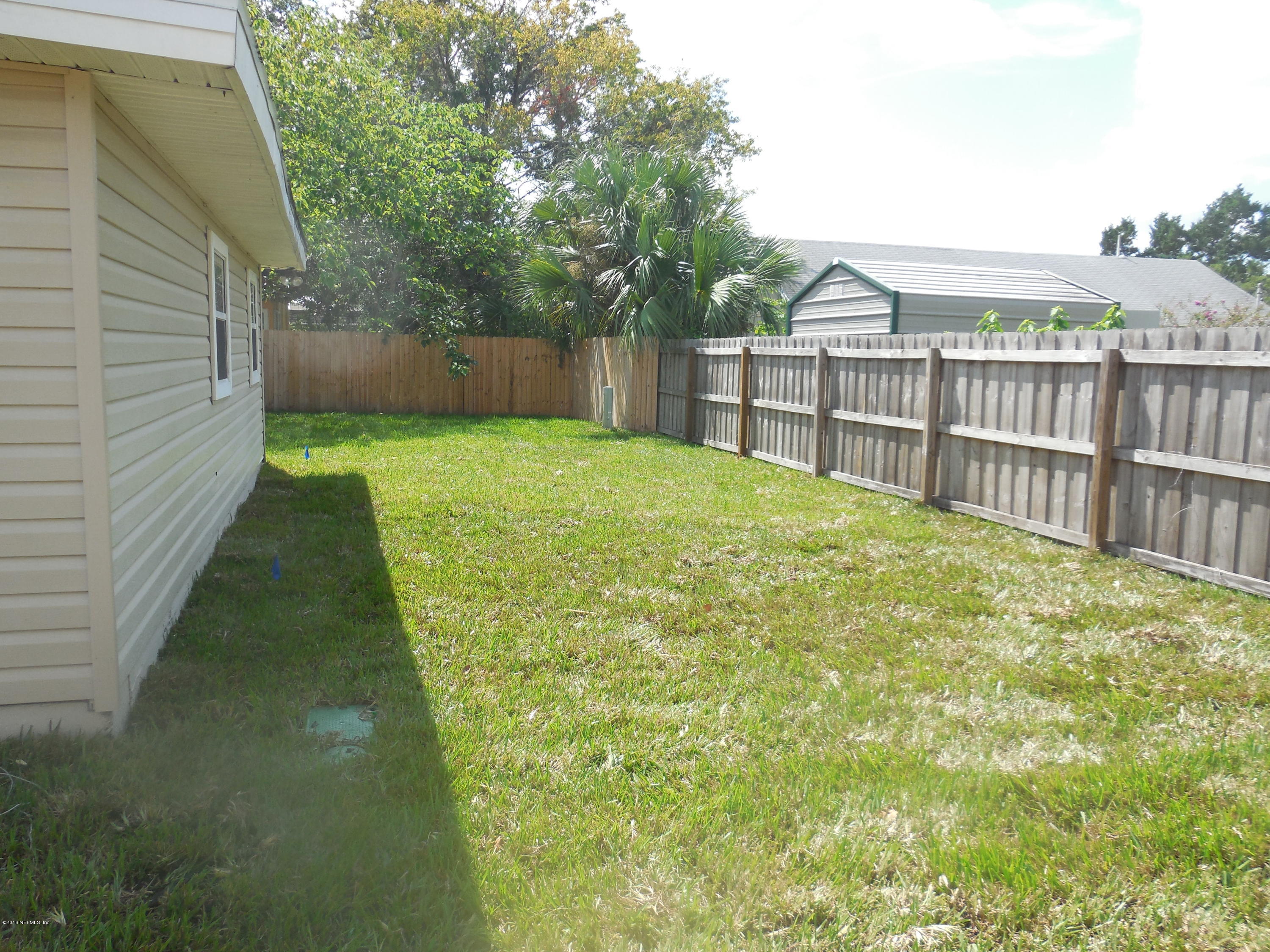 464 Sargo Road Atlantic Beach, FL 32233 - Photo 15 of 15 a view of backyard with green space