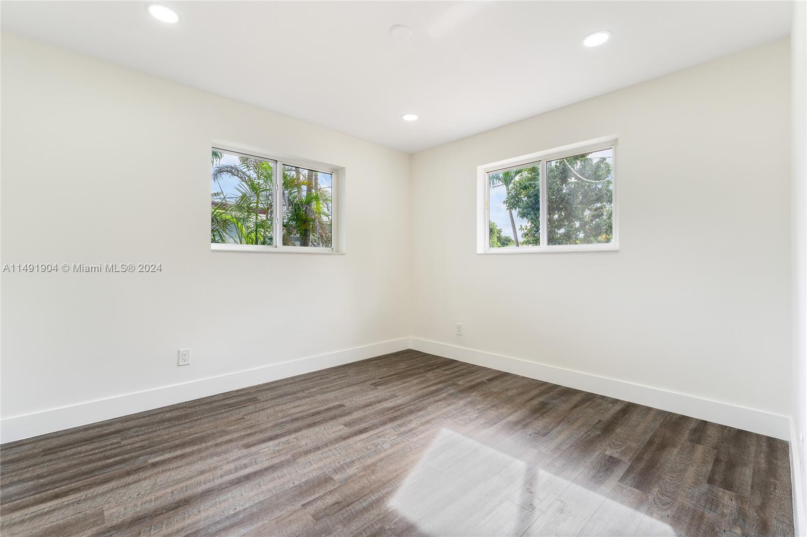 3254 Lincoln Street Hollywood, FL 33021 - Photo 24 of 27 a view of room with wooden floor and window