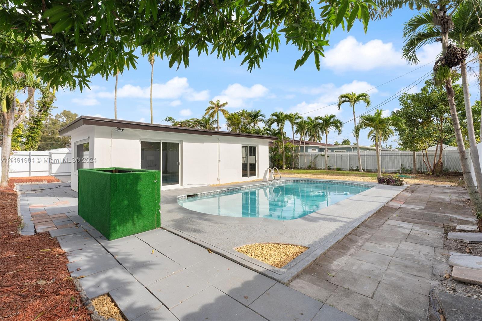 3254 Lincoln Street Hollywood, FL 33021 - Photo 26 of 27 a view of outdoor space yard and swimming pool