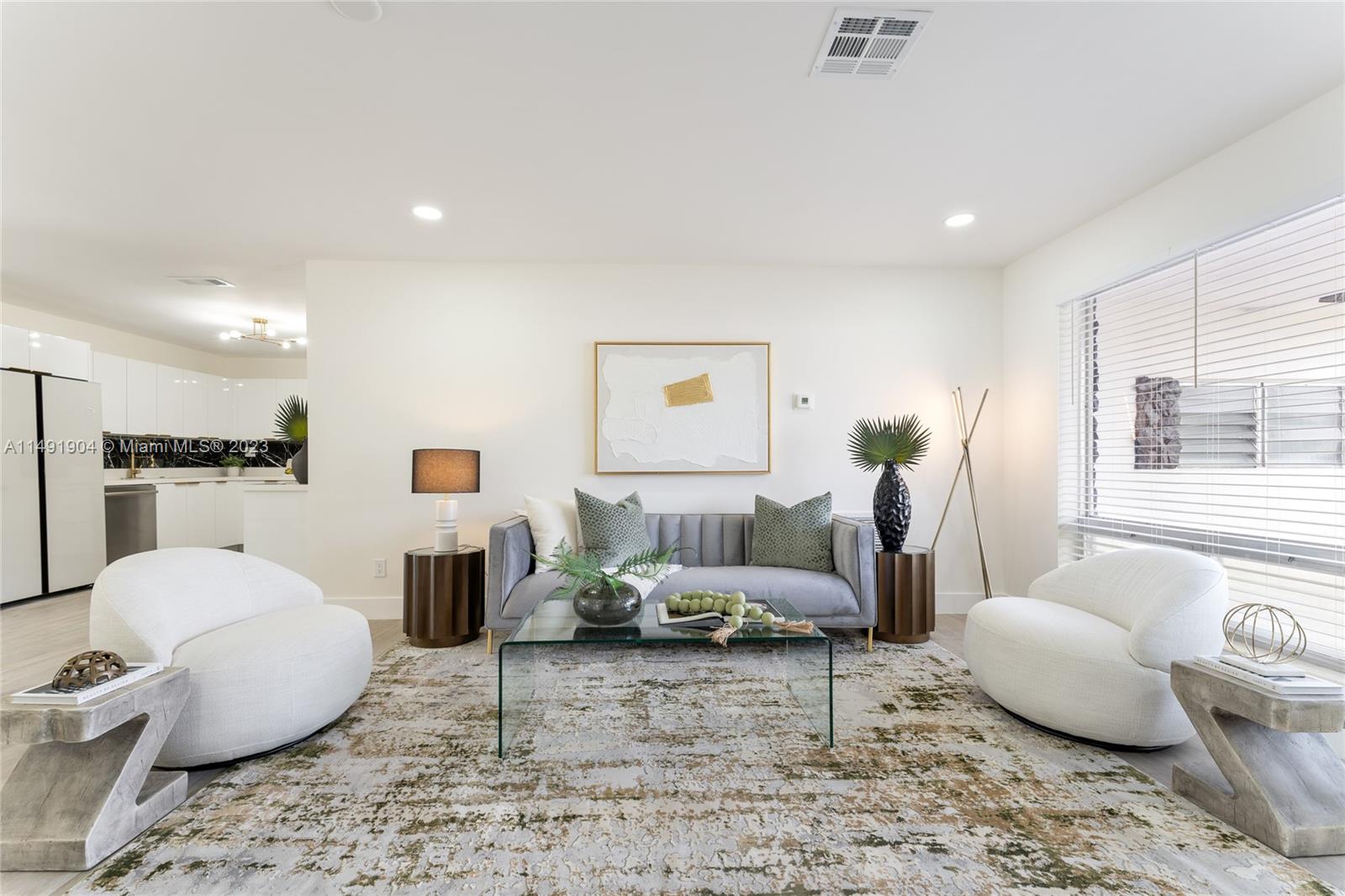 3254 Lincoln Street Hollywood, FL 33021 - Photo 10 of 27 a living room with furniture and a large window