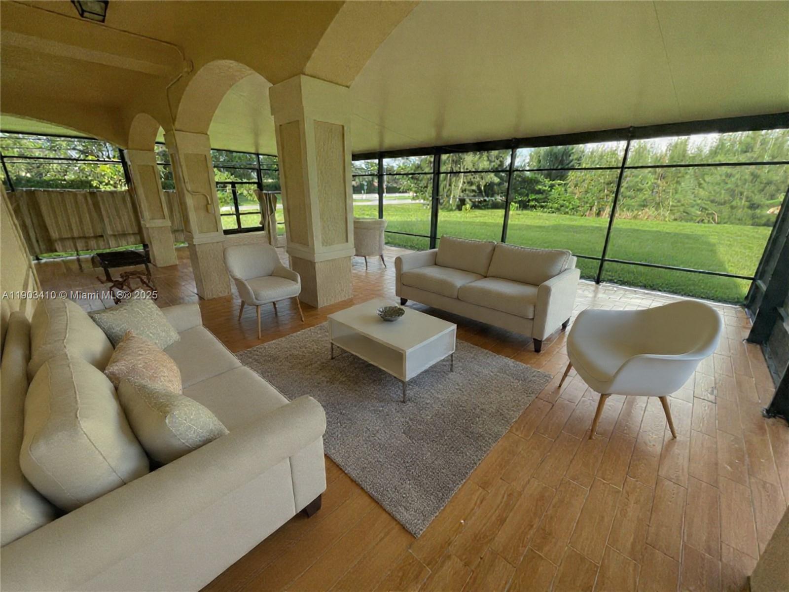 3301 Southwest 139th Avenue, Unit 3301 Miramar, FL 33027 - Photo 38 of 44 Sun room staged