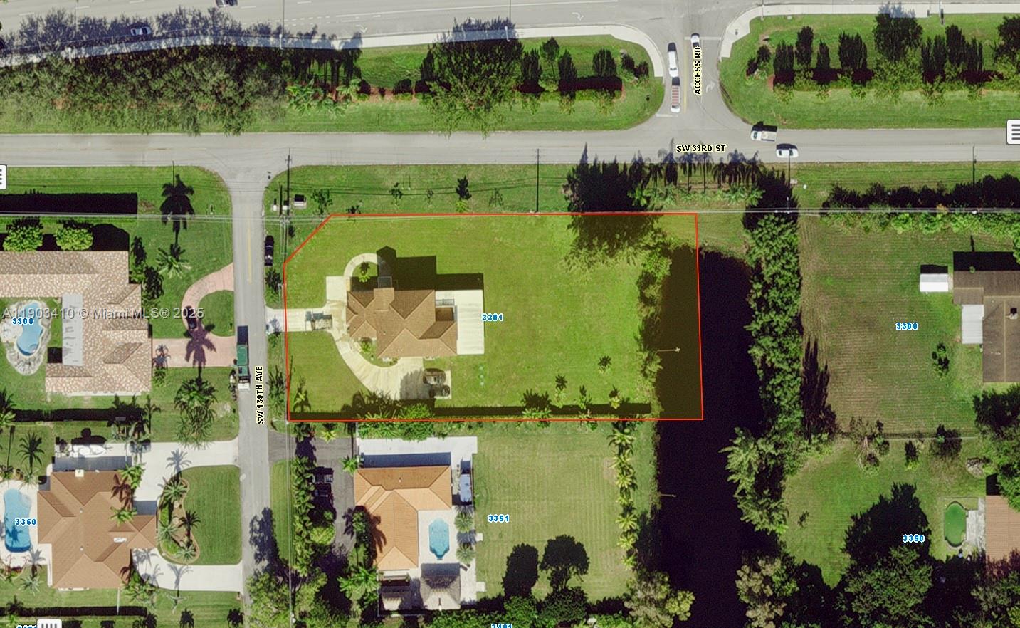 3301 Southwest 139th Avenue, Unit 3301 Miramar, FL 33027 - Photo 43 of 44 an aerial view of lake residential house with outdoor space and swimming pool