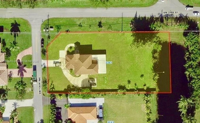 3301 Southwest 139th Avenue, Unit 3301 Miramar, FL 33027 - Photo 44 of 44 an aerial view of a residential houses with outdoor space and swimming pool