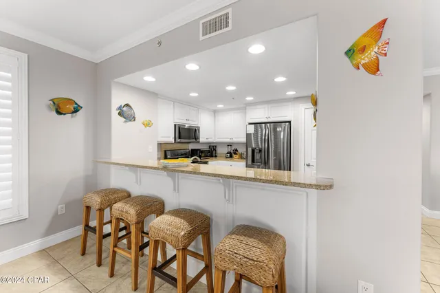 $925,000 | 5004 Thomas Drive, Unit 112, Panama City Beach, FL 32408