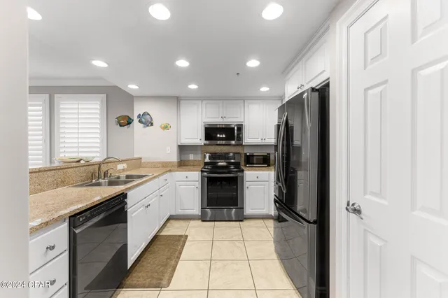 $925,000 | 5004 Thomas Drive, Unit 112, Panama City Beach, FL 32408