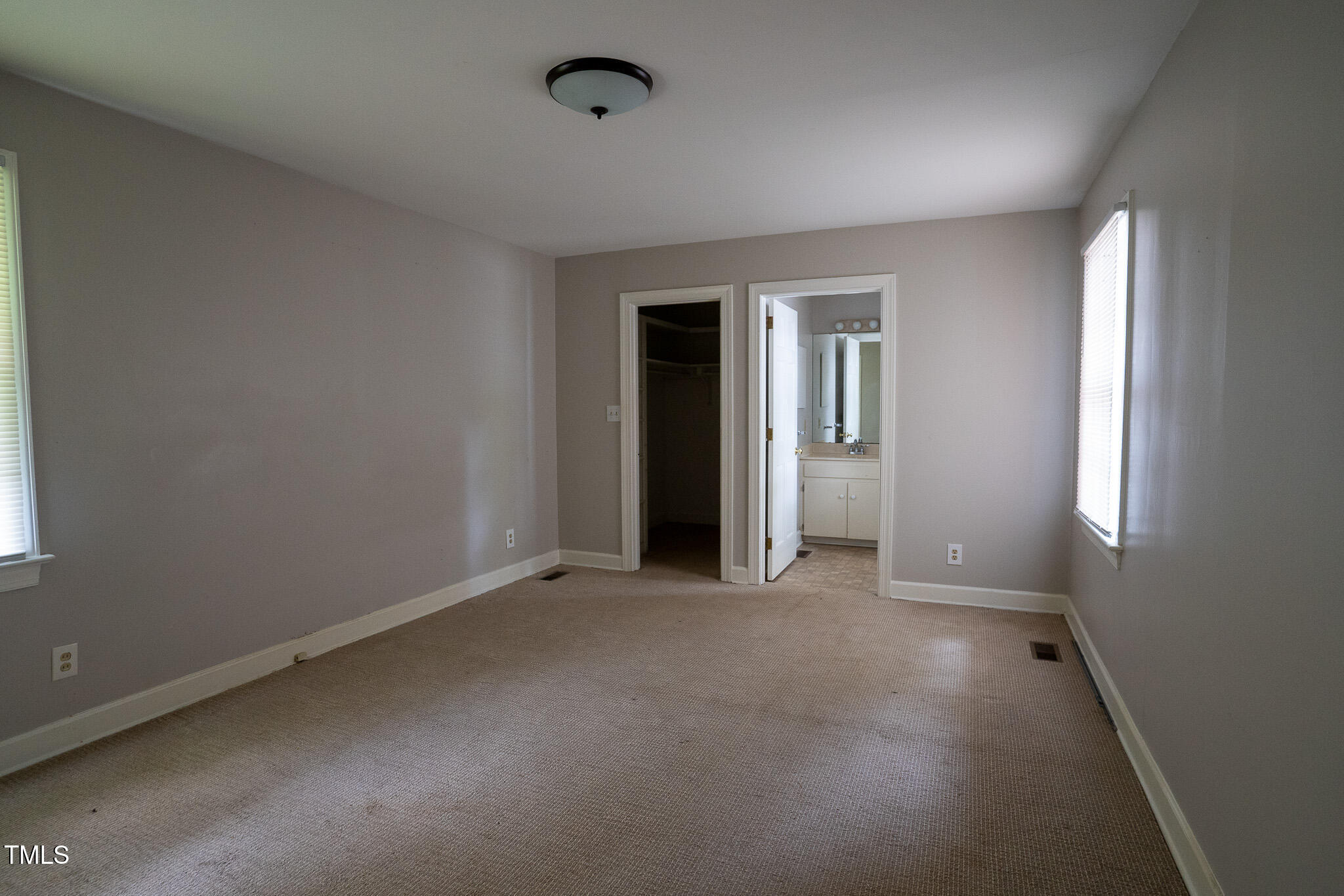 2100 Breeze Road Raleigh, NC 27608 - Photo 7 of 21 an empty room with windows