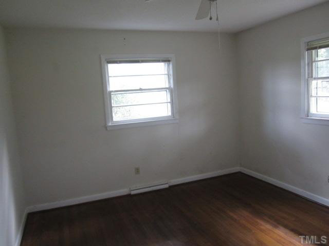 7949 Autry Mill Road Dunn, NC 28334 - Photo 6 of 7 an empty room with a window