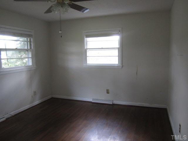 7949 Autry Mill Road Dunn, NC 28334 - Photo 7 of 7 an empty room with a window