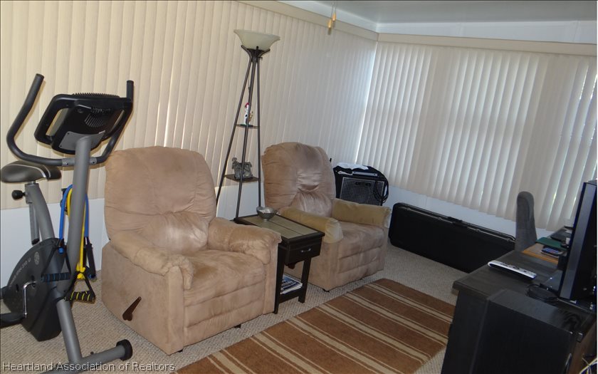 4219 Mandarin Road Sebring, FL 33875 - Photo 5 of 23 a view of balcony with furniture