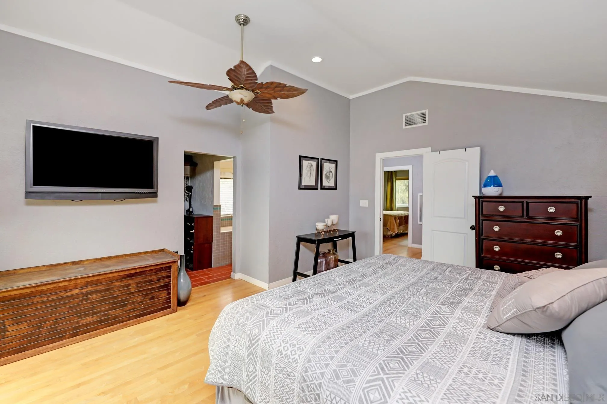 15130 Rios Canyon Road El Cajon, CA 92021 - Photo 32 of 59 a bedroom with a bed and a flat screen tv