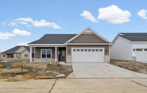 a view of house with yard
