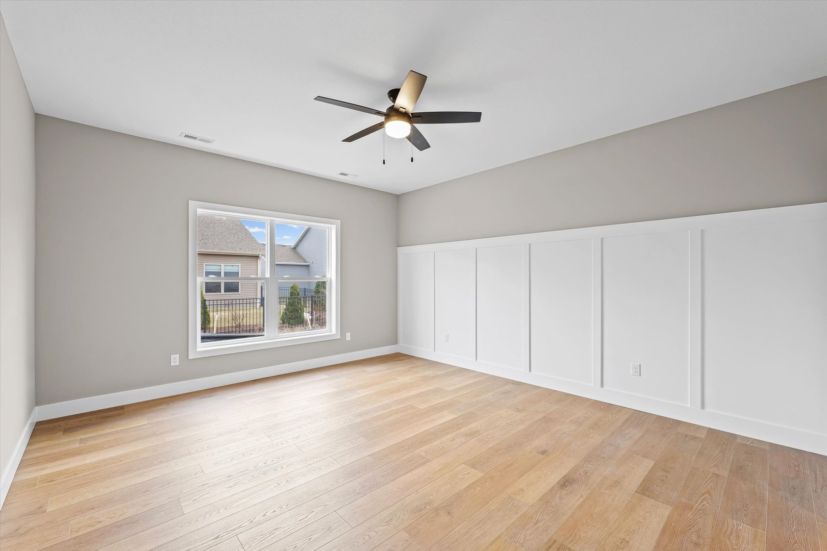 3902 Bay Circle Champaign, IL 61822 - Photo 14 of 29 wooden floor in an empty room with a window