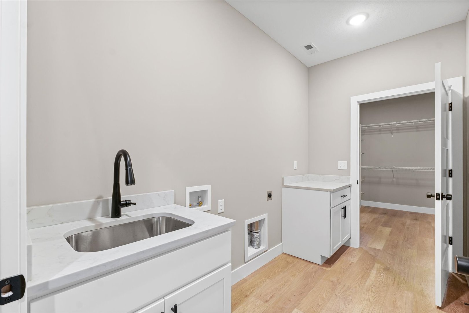 3902 Bay Circle Champaign, IL 61822 - Photo 18 of 29 a close view of a sink and utility room