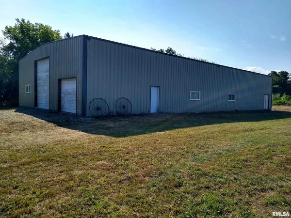 a house view with a backyard space