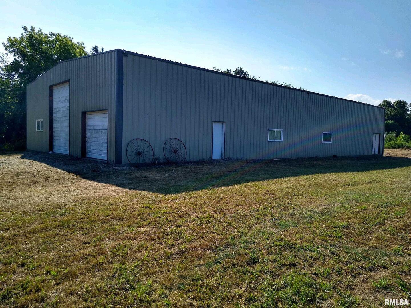 39 Bushwack Road Golconda, IL 62938 - Photo 5 of 28 a house view with a backyard space