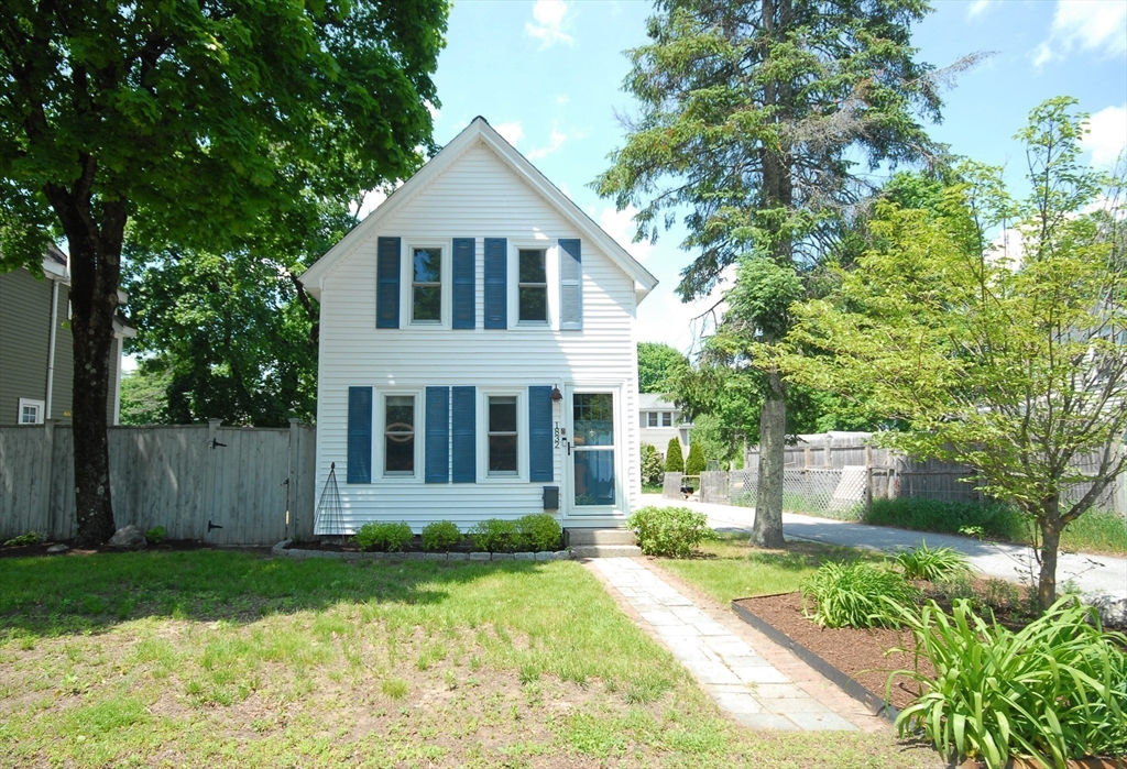 1832 Main Street Concord, MA 01742 - Photo 23 of 25 a front view of a house with a yard