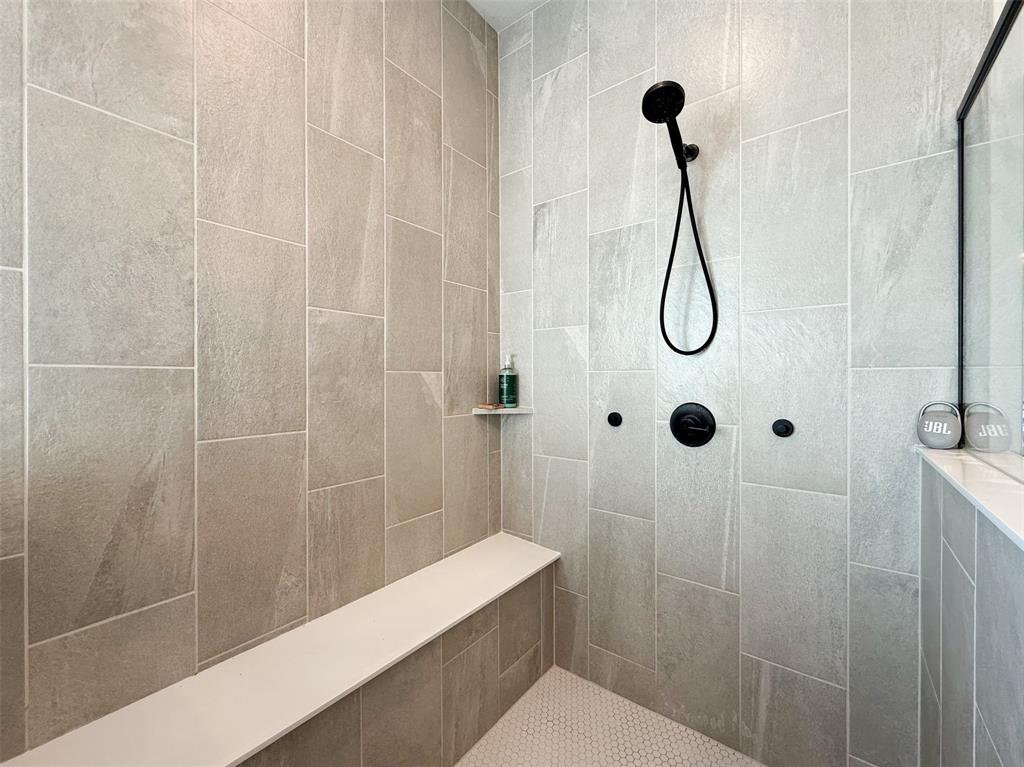 12116 Magma Court Krum, TX 76249 - Photo 16 of 30 a bathroom with a sink a toilet and shower