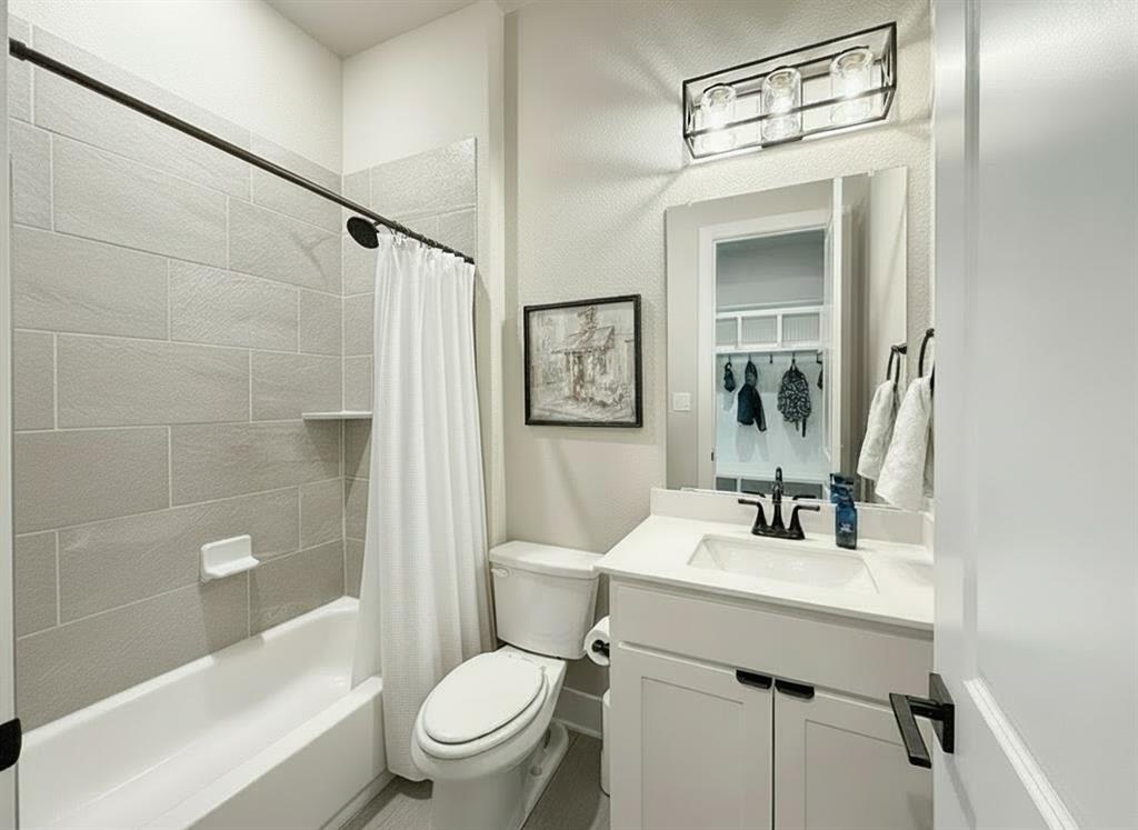 12116 Magma Court Krum, TX 76249 - Photo 21 of 30 a bathroom with a sink toilet tub and shower