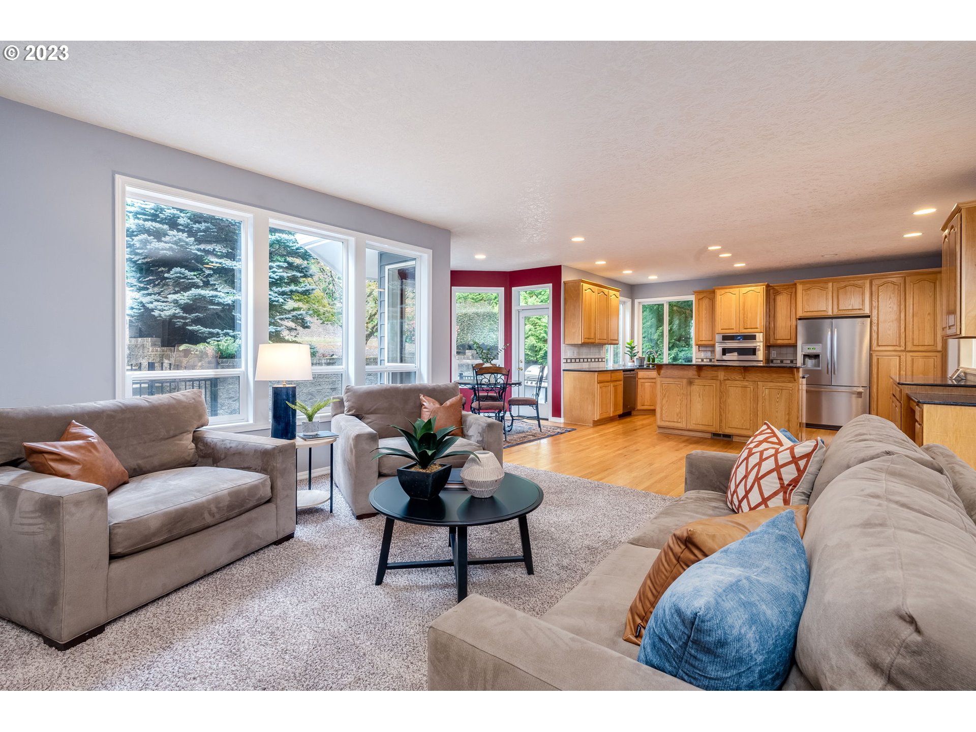 2842 Southeast Morlan Place Gresham, OR 97080 - Photo 13 of 46 a living room with furniture and a large window