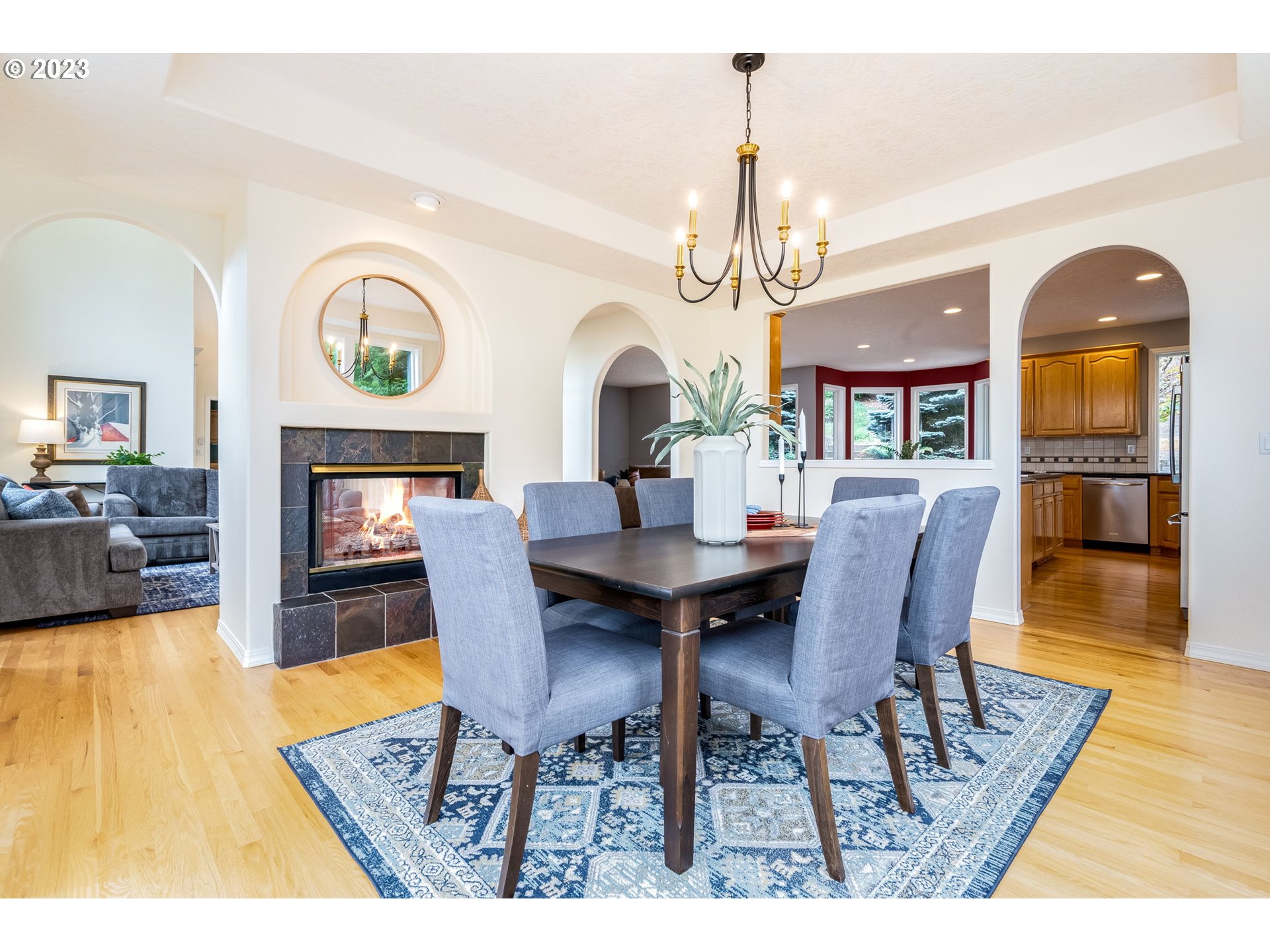 2842 Southeast Morlan Place Gresham, OR 97080 - Photo 14 of 46 a view of a dining room with furniture window and wooden floor