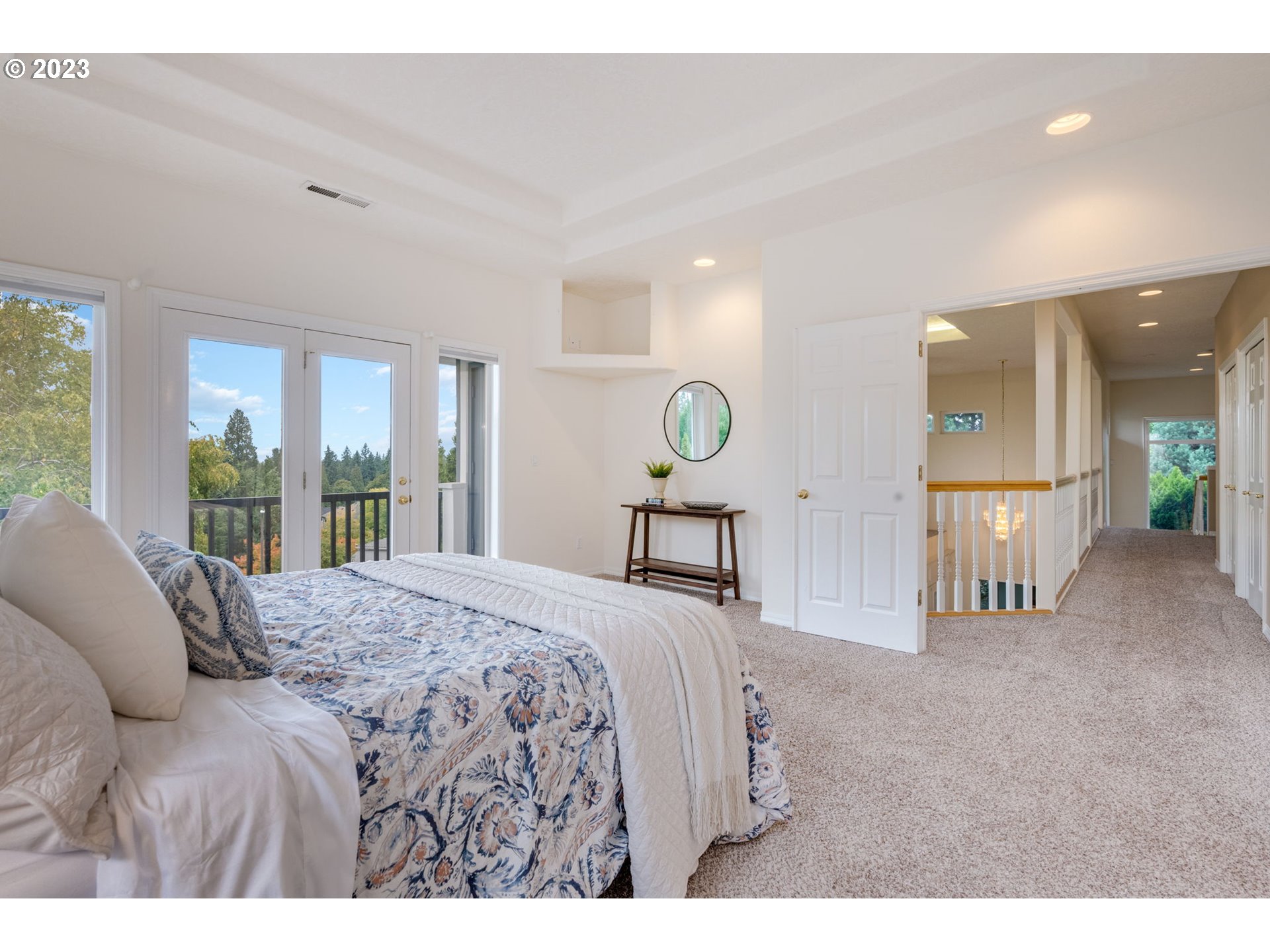 2842 Southeast Morlan Place Gresham, OR 97080 - Photo 17 of 46 a bed room with a bed and large mirror