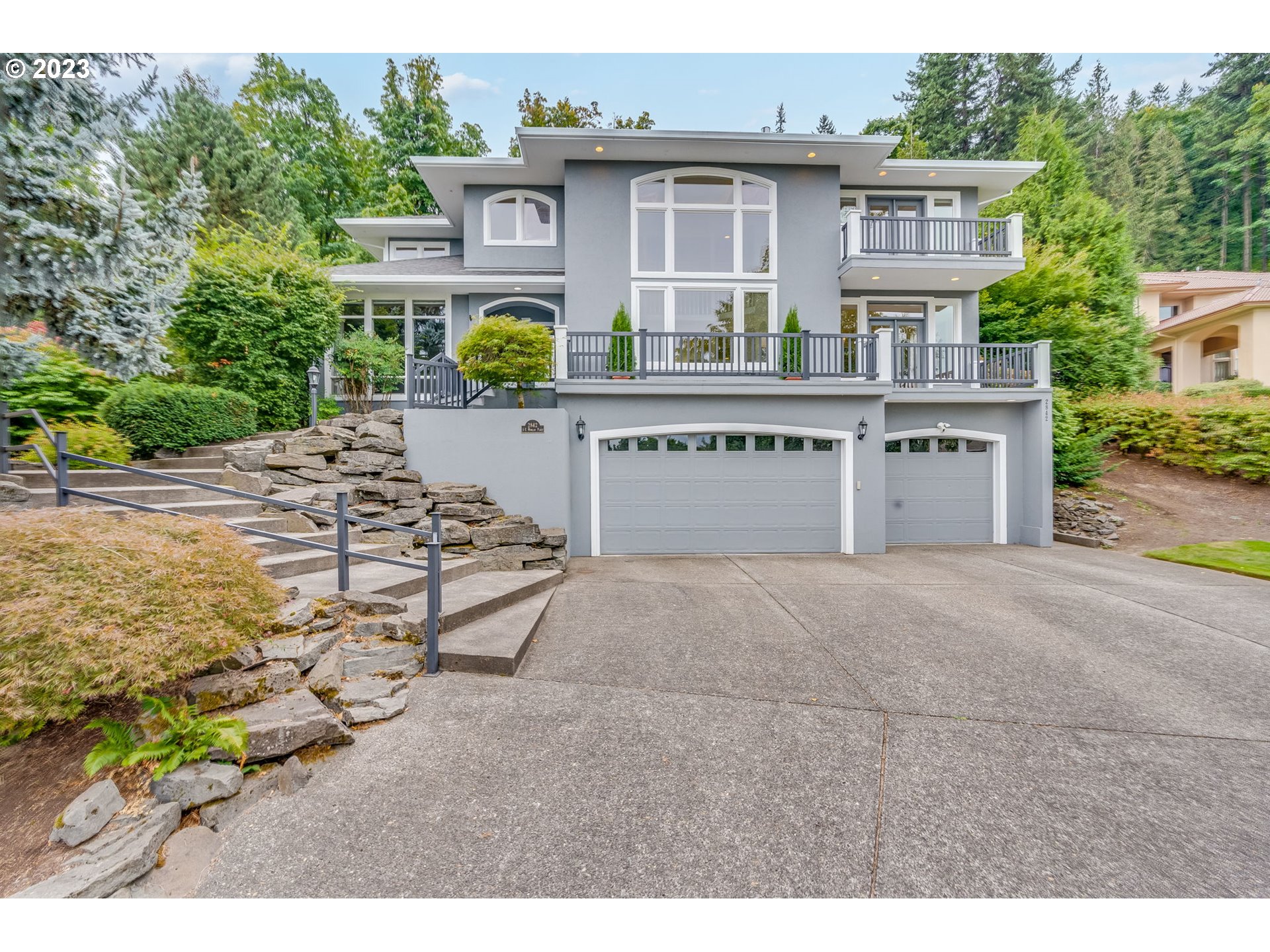2842 Southeast Morlan Place Gresham, OR 97080 - Photo 2 of 46 a house view with a garden space