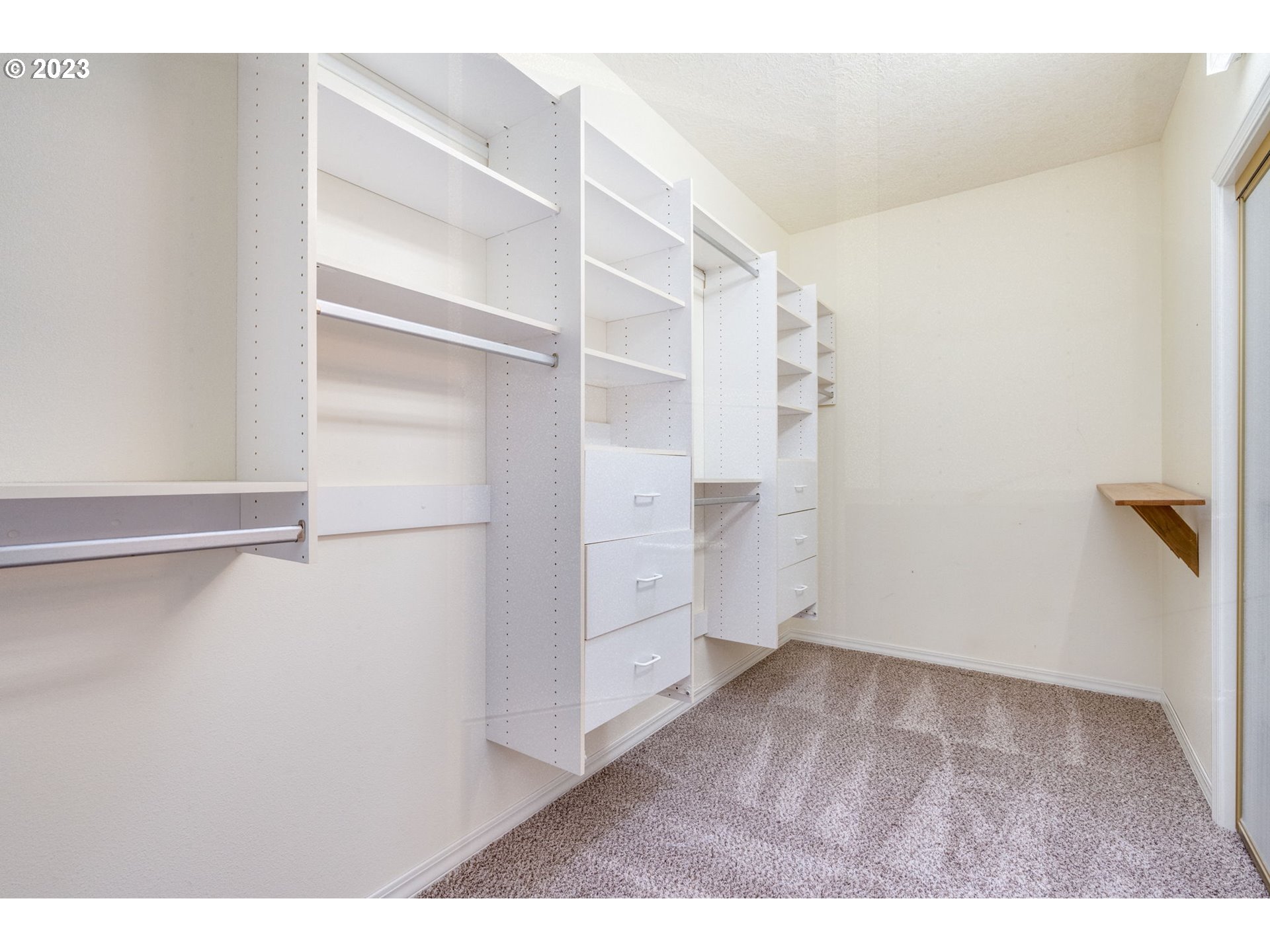 2842 Southeast Morlan Place Gresham, OR 97080 - Photo 22 of 46 a view of walk in closet with empty racks