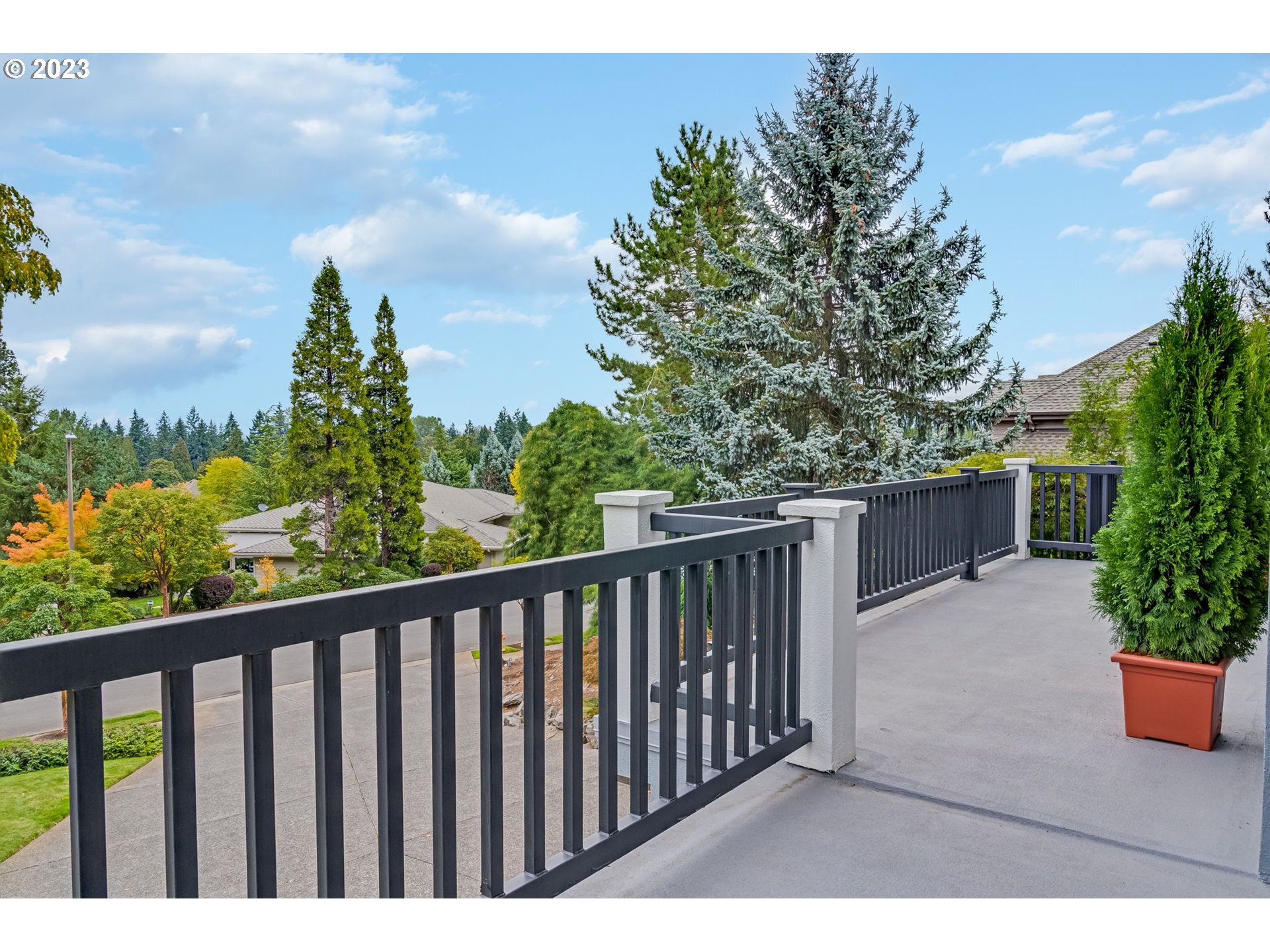 2842 Southeast Morlan Place Gresham, OR 97080 - Photo 33 of 46 a balcony with wooden floor in front of it