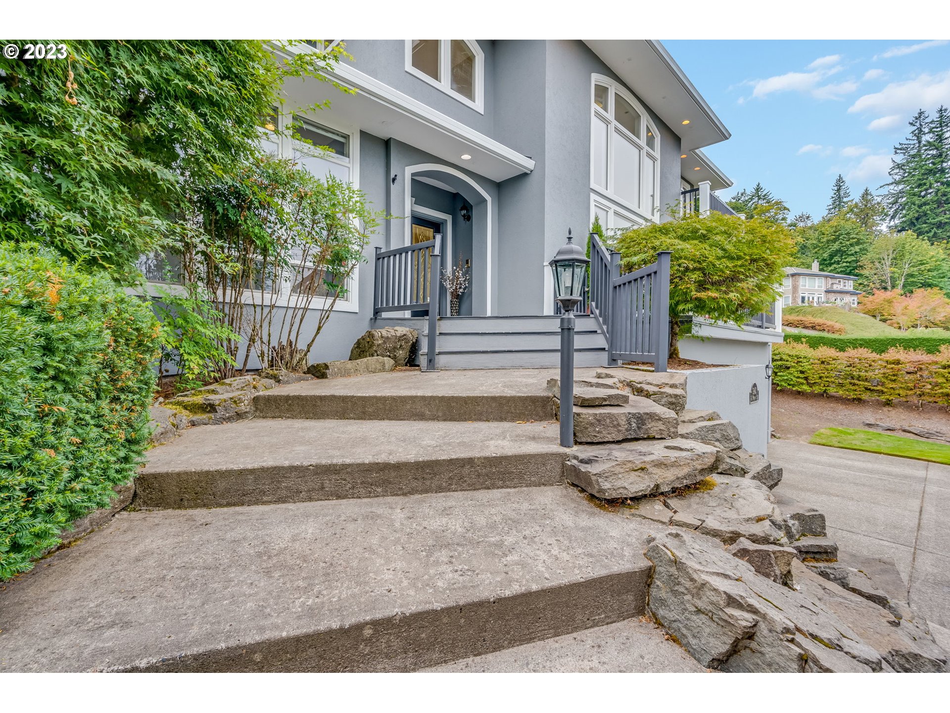 2842 Southeast Morlan Place Gresham, OR 97080 - Photo 35 of 46 a front view of a house with a garden
