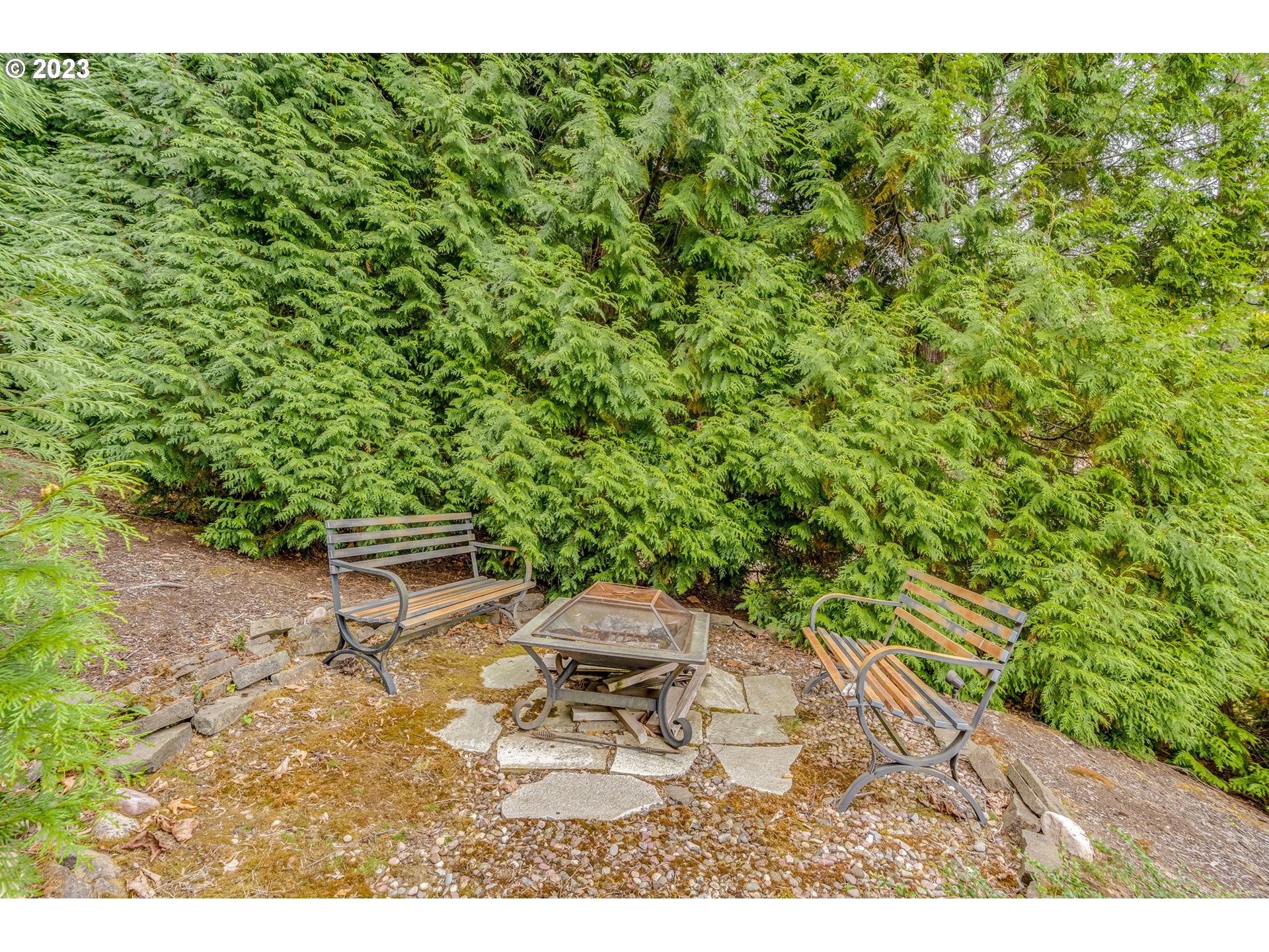 2842 Southeast Morlan Place Gresham, OR 97080 - Photo 42 of 46 a backyard of a house with yard and outdoor seating