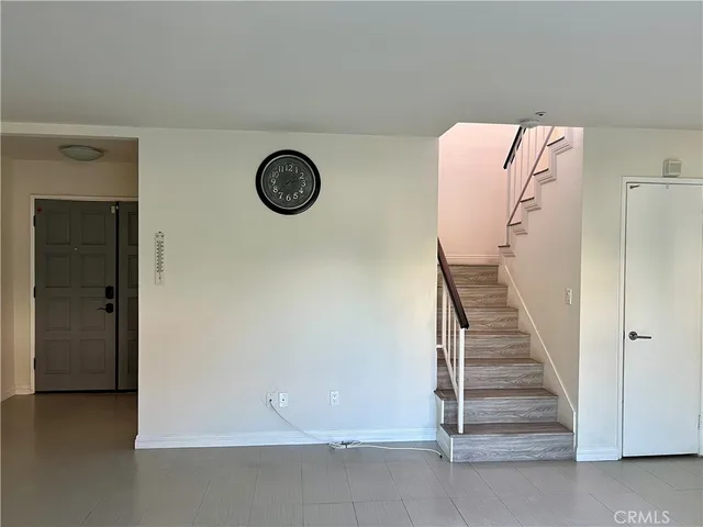 a view of a hallway with staircase