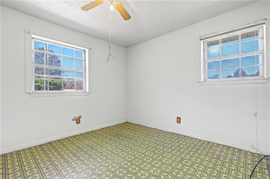 1408 Prospect Road Chickamauga, GA 30707 - Photo 17 of 27 a view of a room with wooden floor and windows