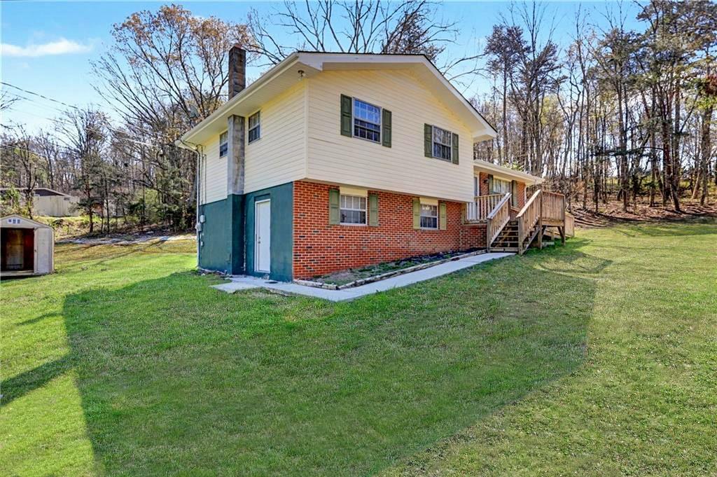 1408 Prospect Road Chickamauga, GA 30707 - Photo 27 of 27 a view of a house with a yard