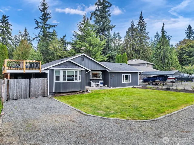 a view of a deck with a yard