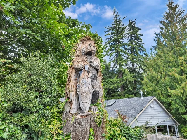 front view of a house with a garden