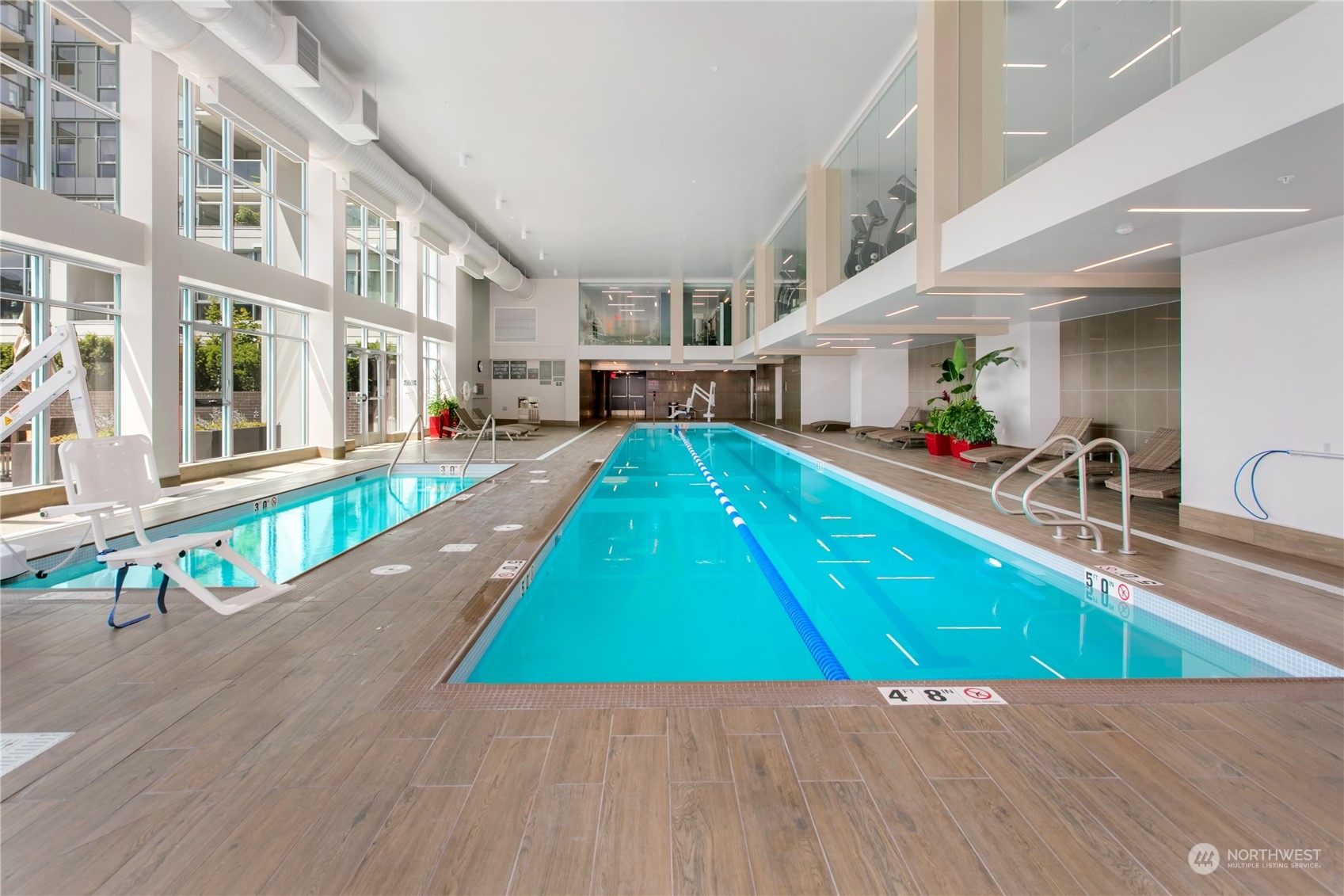 583 Battery Street, Unit 506N Seattle, WA 98121 - Photo 21 of 36 a view of a house with a swimming pool