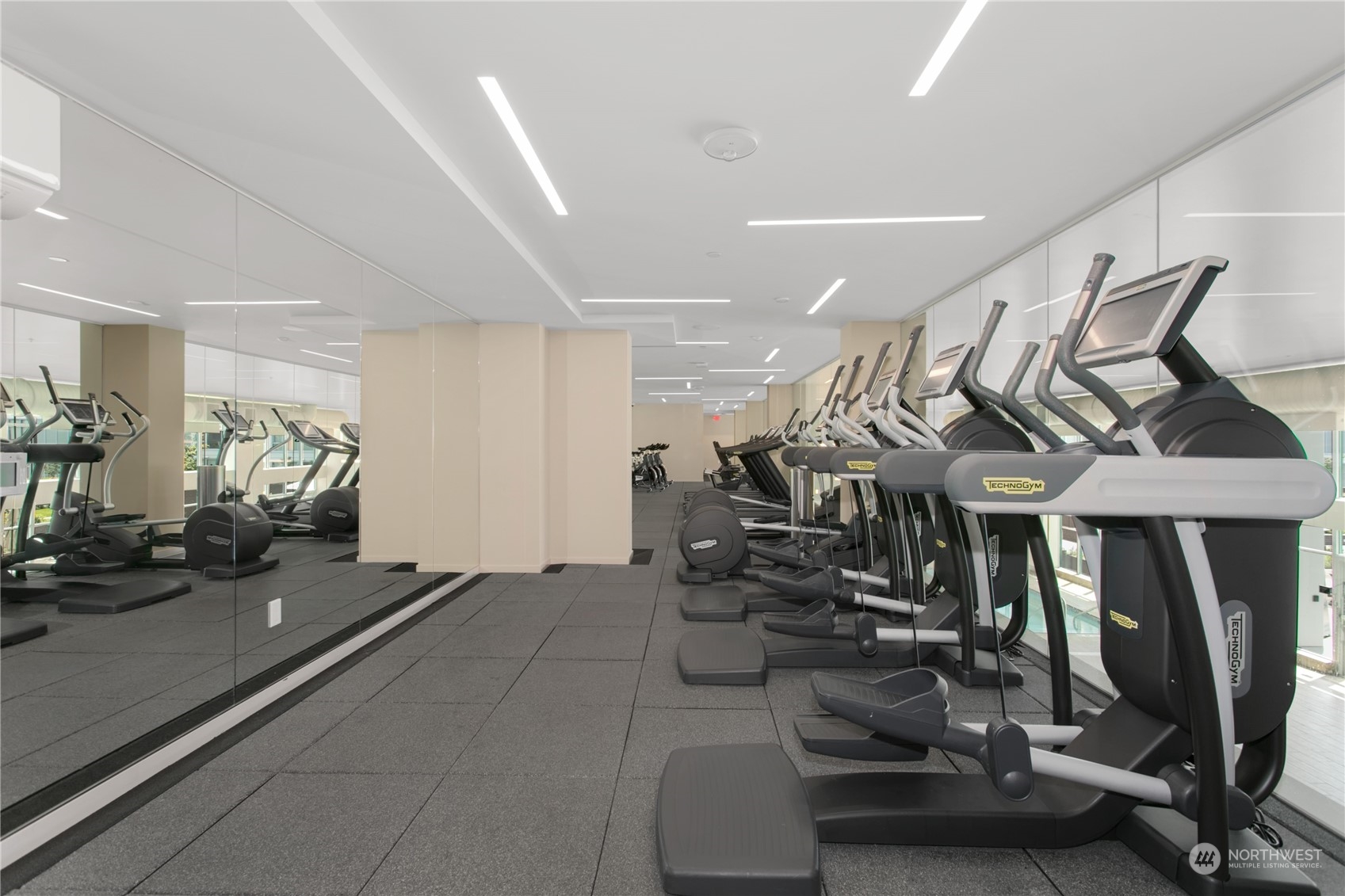 583 Battery Street, Unit 506N Seattle, WA 98121 - Photo 23 of 36 a view of a room with gym equipment