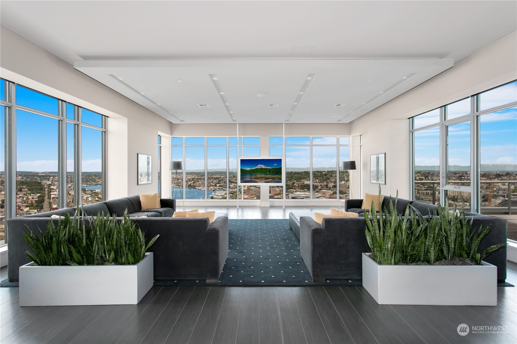 583 Battery Street, Unit 506N Seattle, WA 98121 - Photo 27 of 36 a living room with large windows and a table
