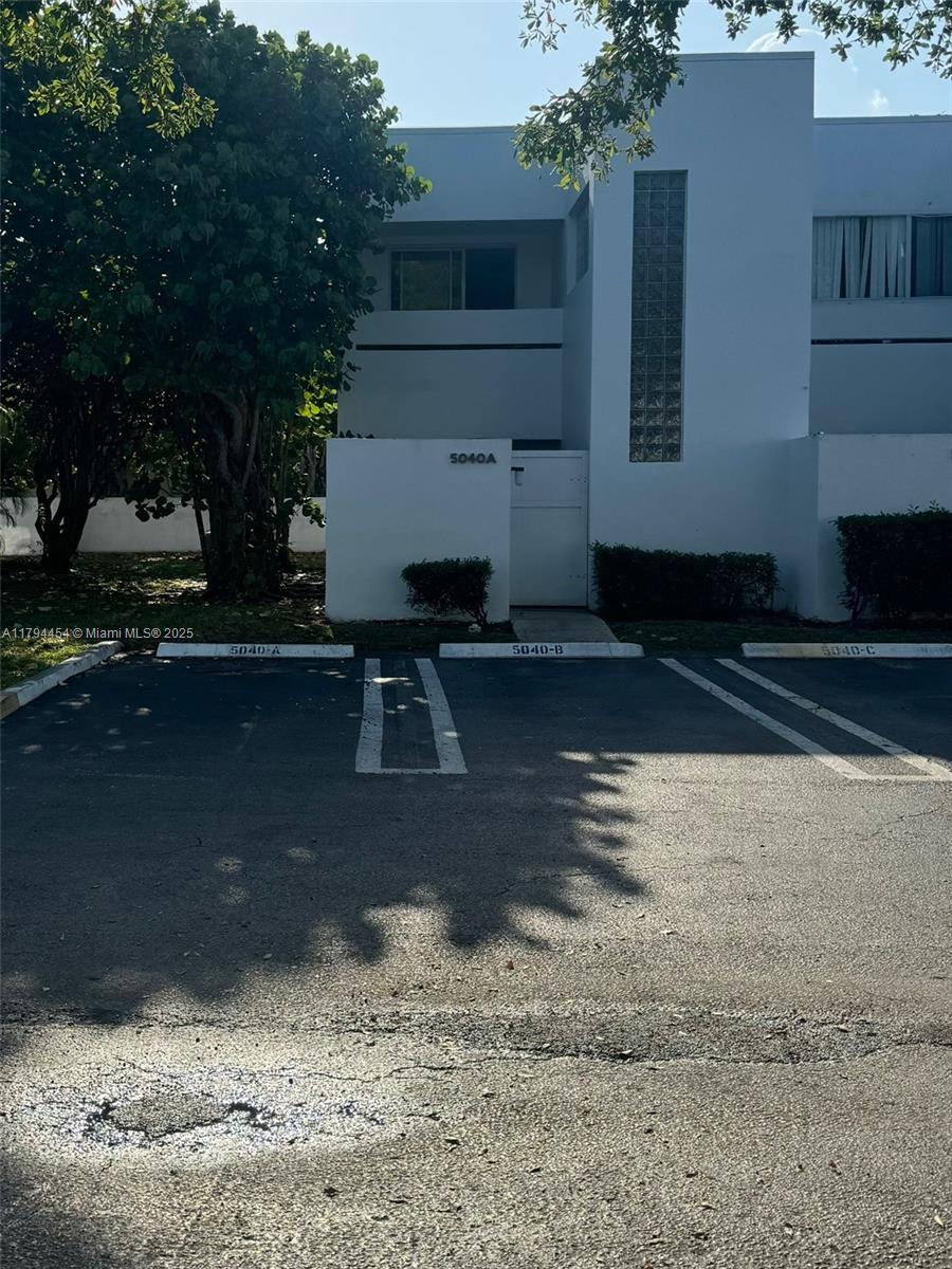 5040 Elmhurst Road, Unit A West Palm Beach, FL 33417 - Photo 1 of 12 a view of backyard with seating space