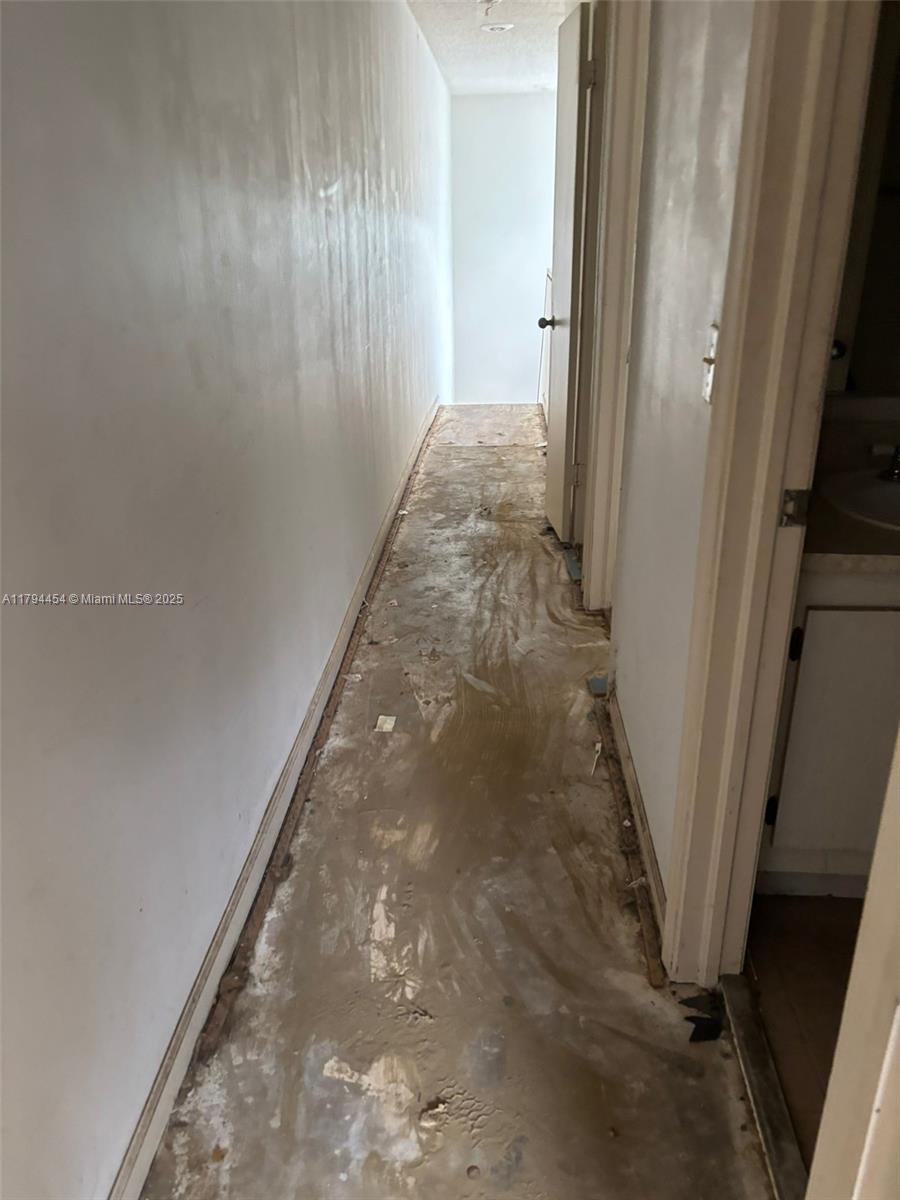 5040 Elmhurst Road, Unit A West Palm Beach, FL 33417 - Photo 11 of 12 a view of a hallway