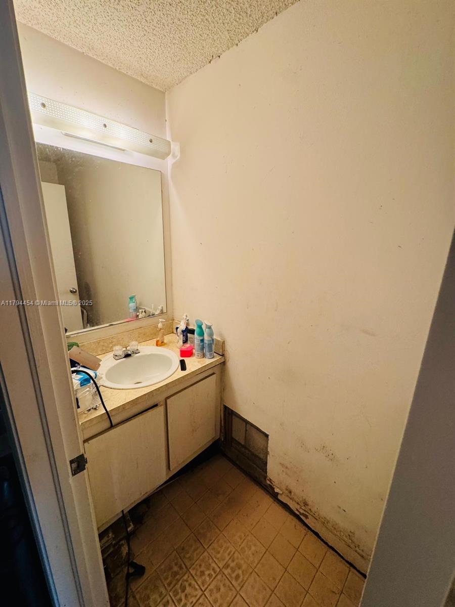 5040 Elmhurst Road, Unit A West Palm Beach, FL 33417 - Photo 8 of 12 a room with storage and utility