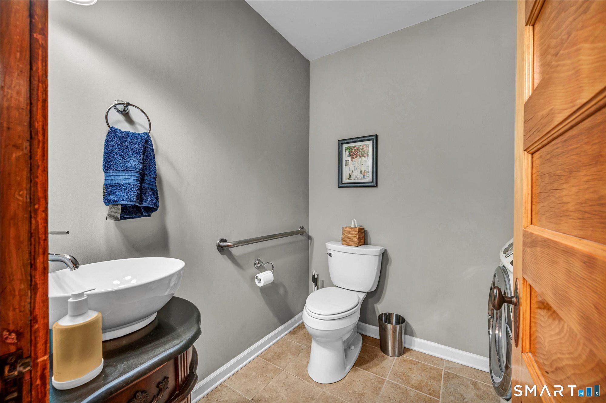 52 Stuart Street Newington, CT 06111 - Photo 32 of 33 First floor bathroom with washer dryer for ease of access!