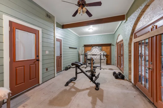 a view of a room with gym equipment