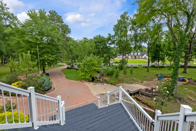 a view of a chairs and table on the deck
