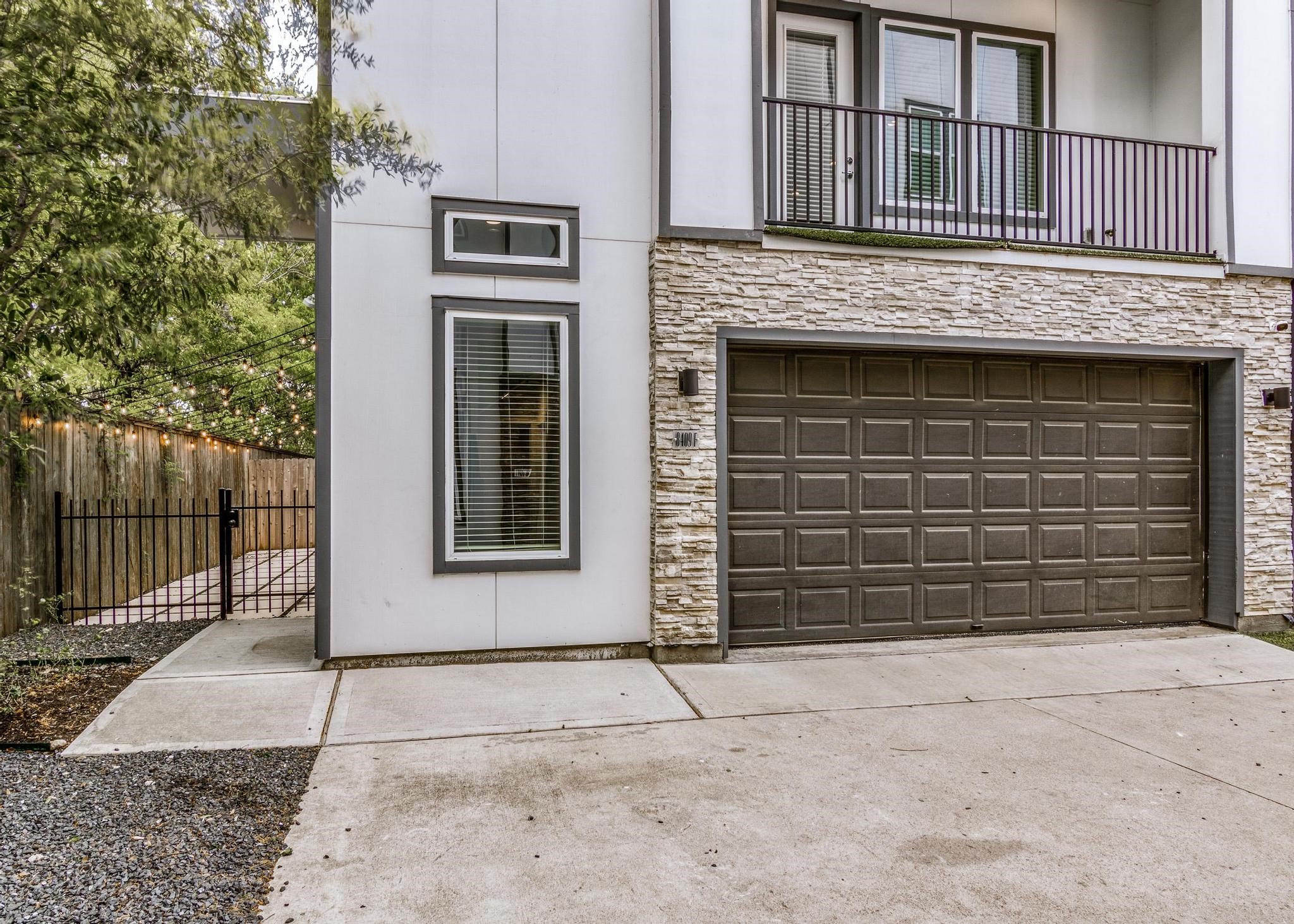 a front view of a house with a garage