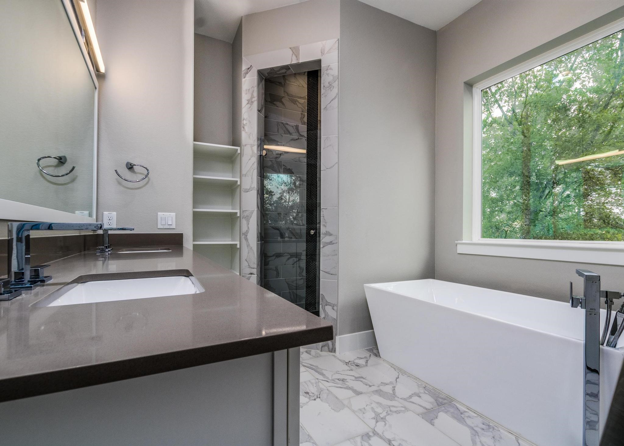 8409 Hempstead Road, Unit F Houston, TX 77008 - Photo 18 of 23 a room with a table and chairs