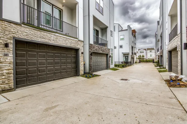 a view of a street with buildings in the background