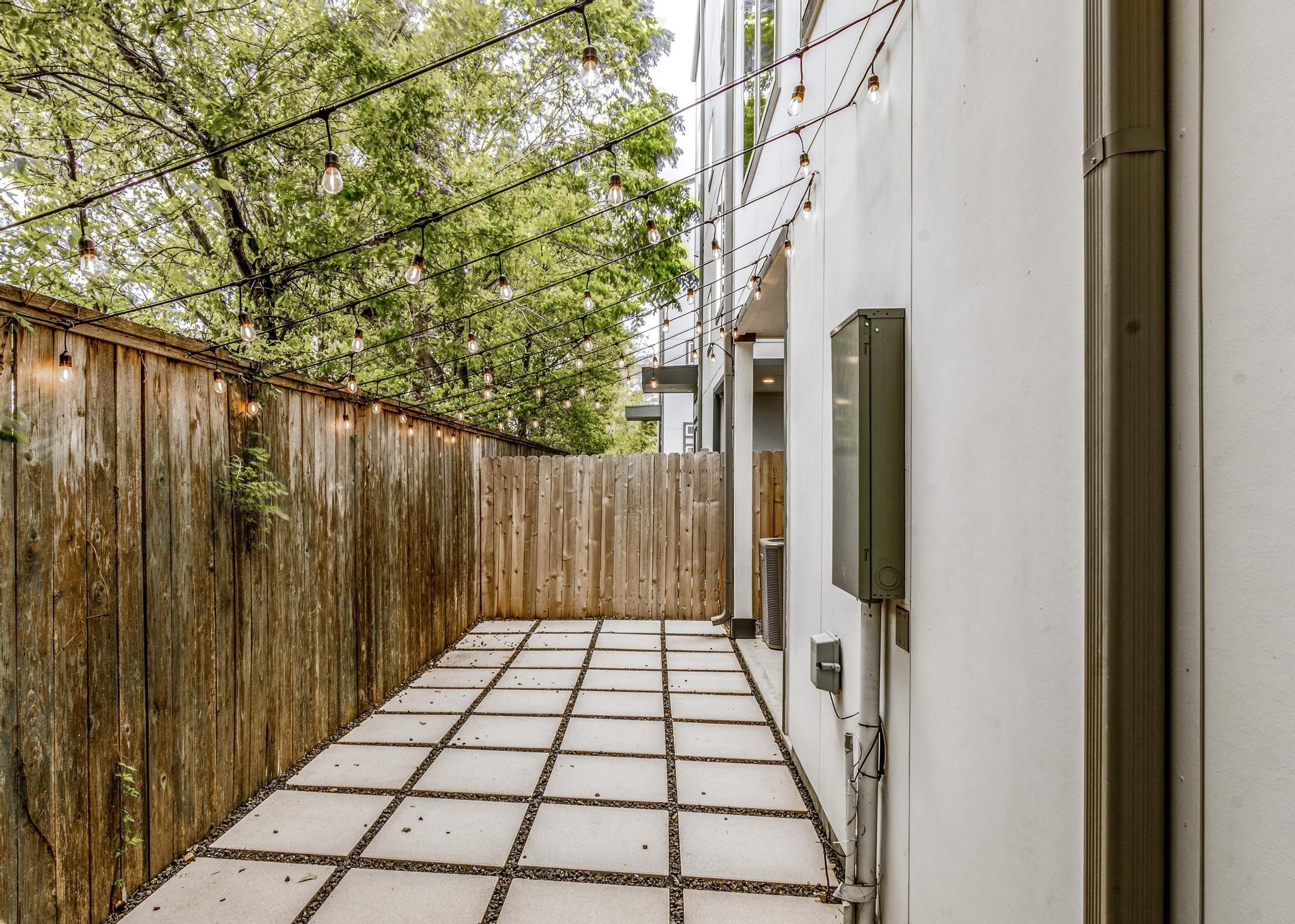 8409 Hempstead Road, Unit F Houston, TX 77008 - Photo 7 of 23 a view of a wooden fence