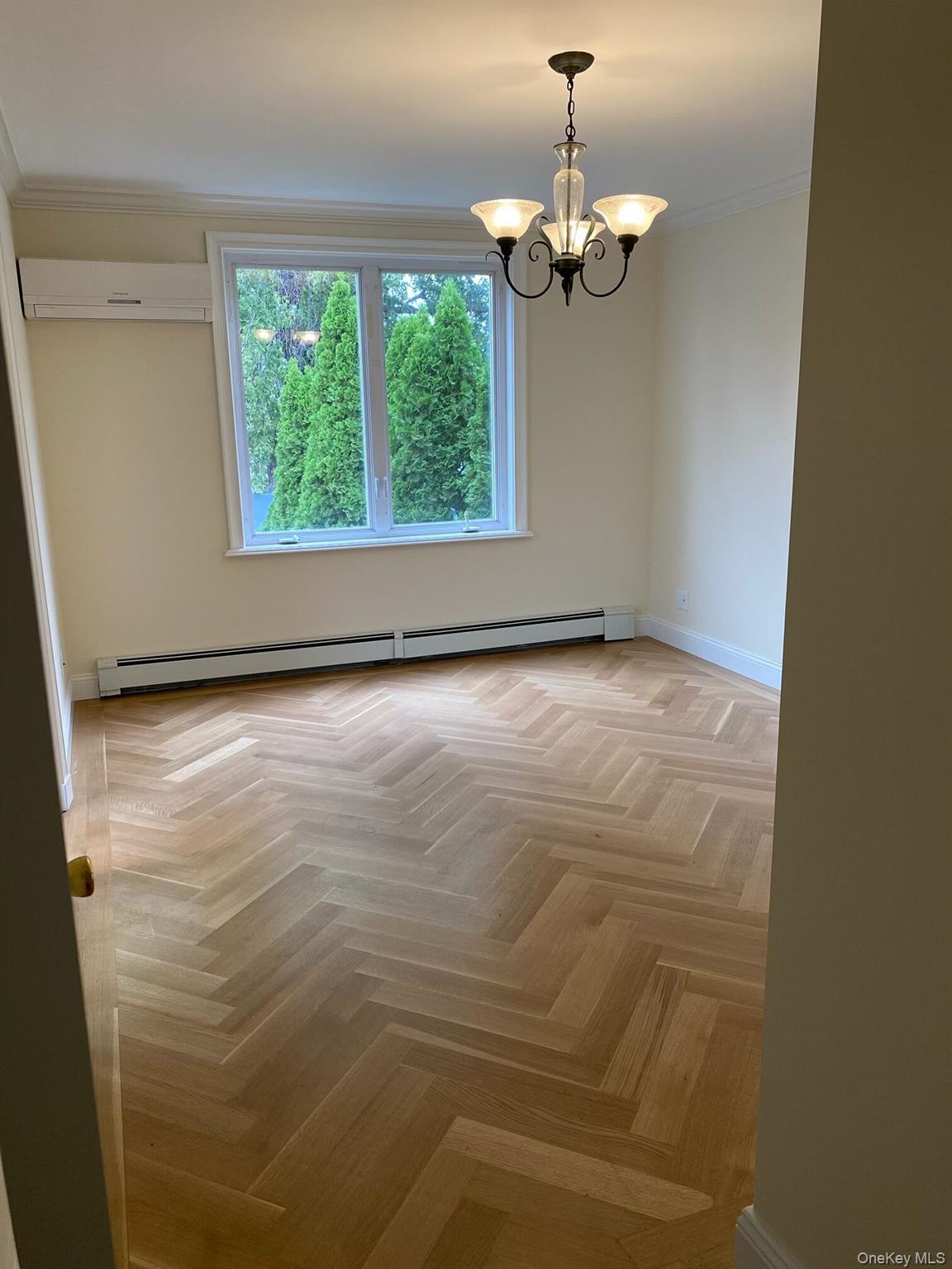 52-62 68th Street Queens, NY 11378 - Photo 6 of 15 a view of an empty room with a window