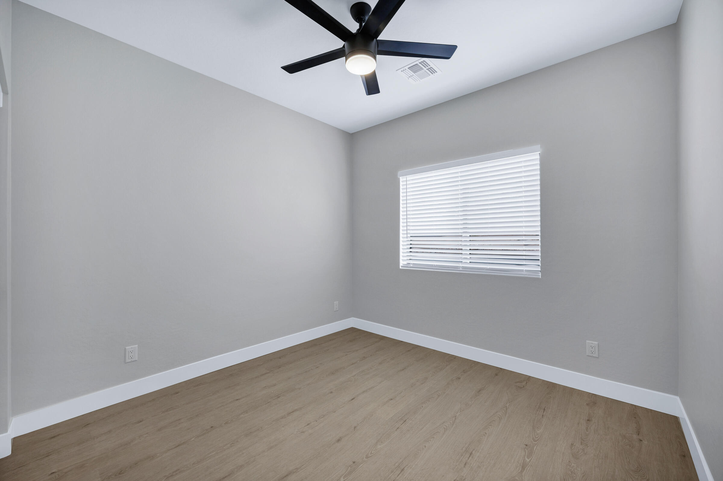 1105 East Frontier Street Payson, AZ 85541 - Photo 18 of 26 wooden floor in an empty room with a window